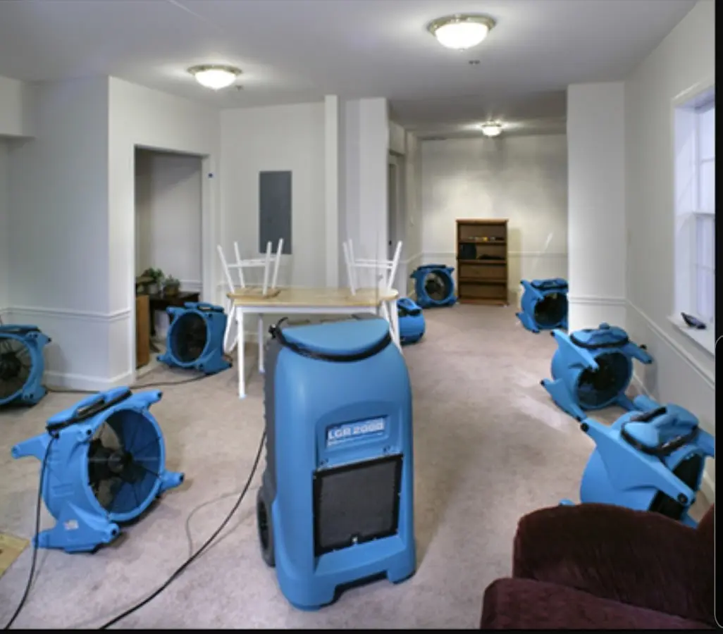Air movers and dehumidifier setup for Water Damage Restoration in Independence